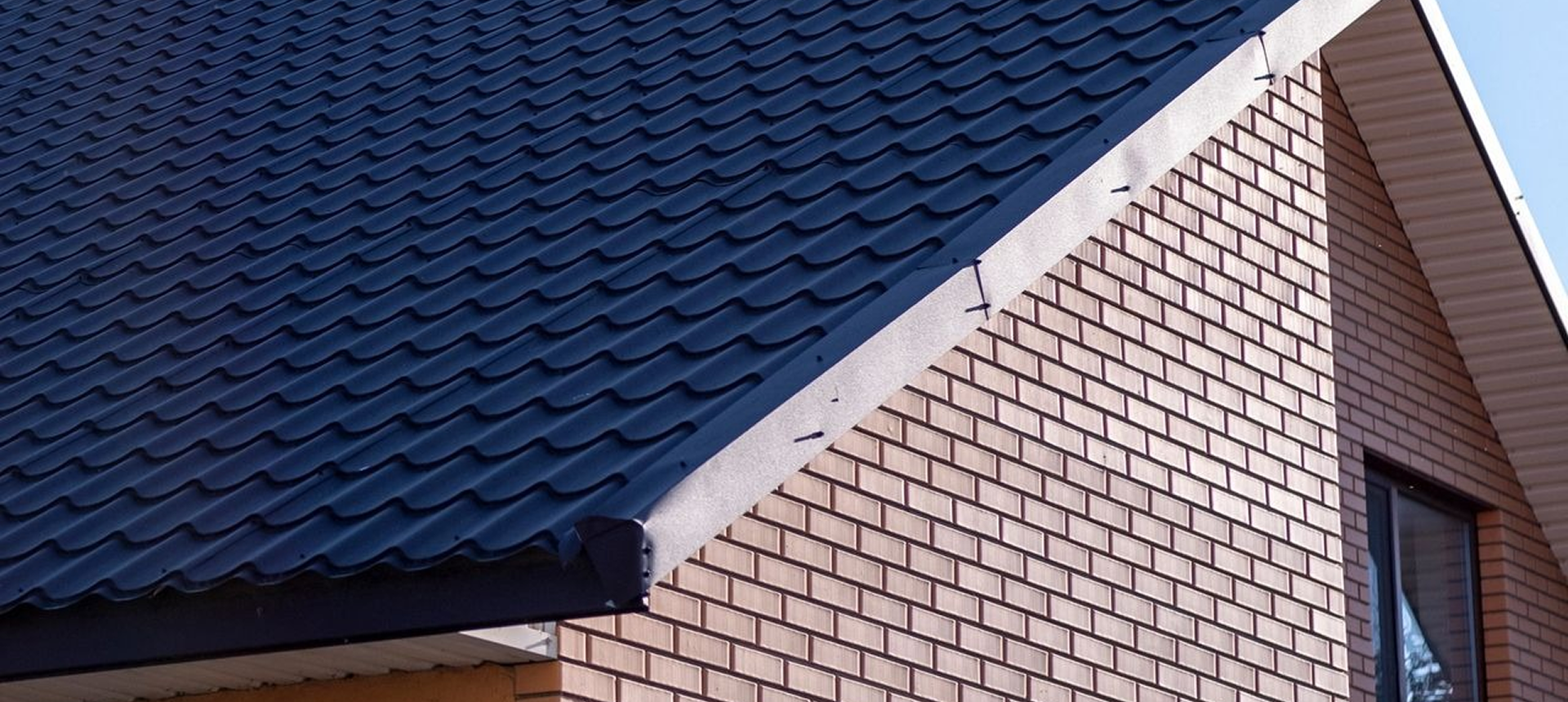 House with patterned roof tiles